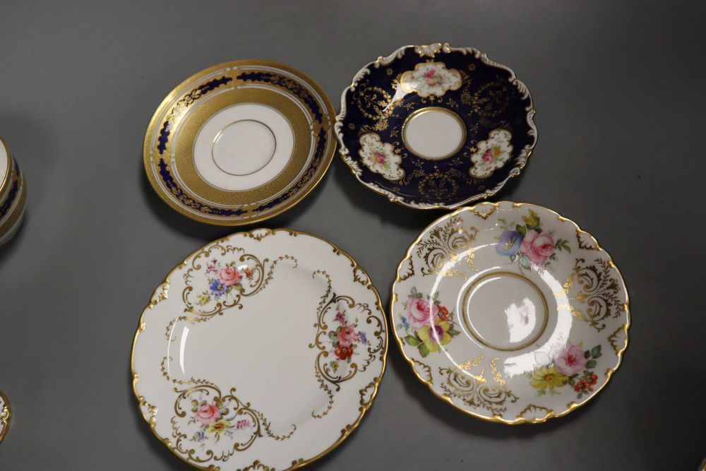 A Royal Crown Derby teacup, a saucer and a tea plate,